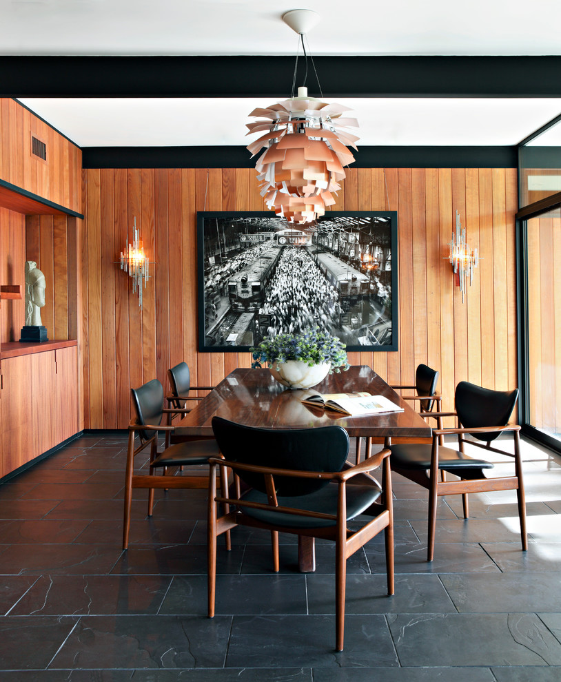 Immagine di una sala da pranzo minimalista con nessun camino