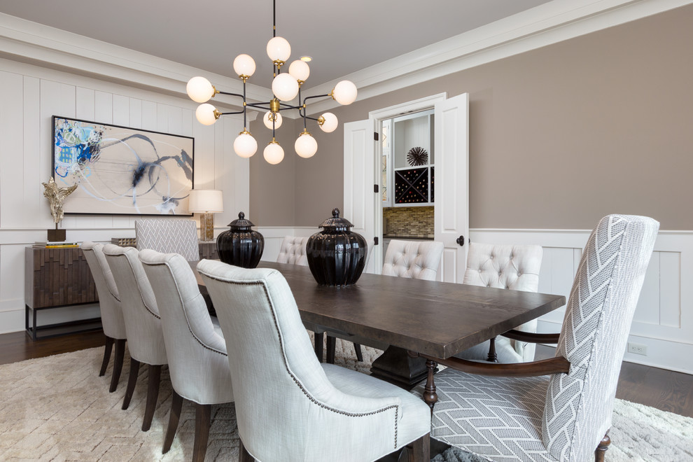Inspiration for a large classic enclosed dining room in Atlanta with brown walls, dark hardwood flooring, brown floors, no fireplace and feature lighting.