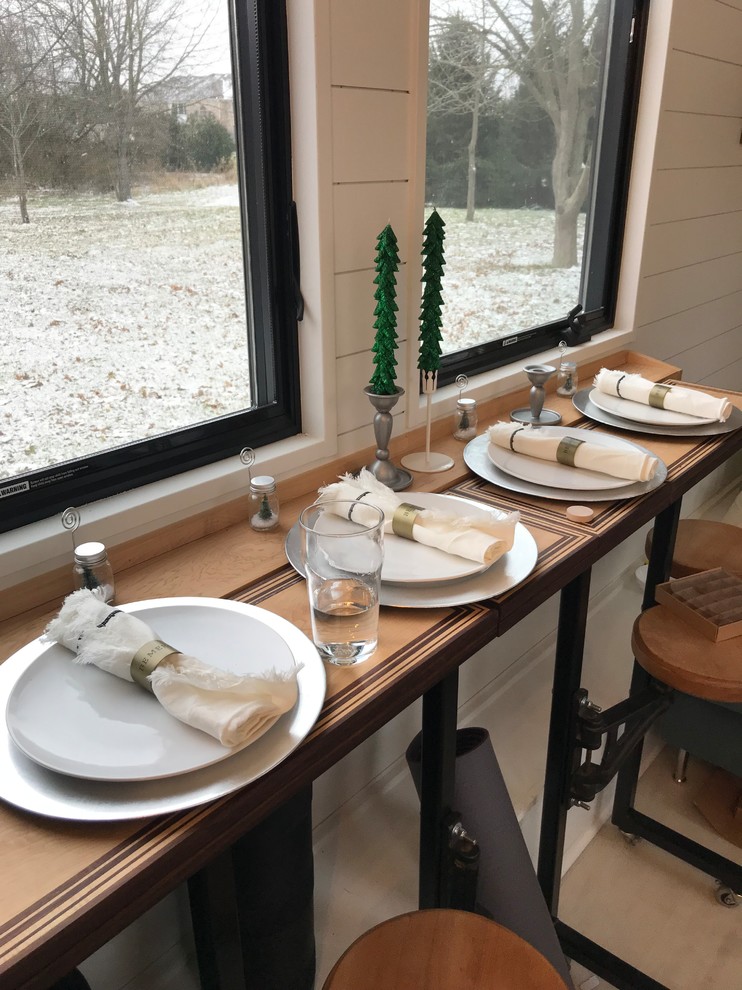 Esempio di una sala da pranzo country