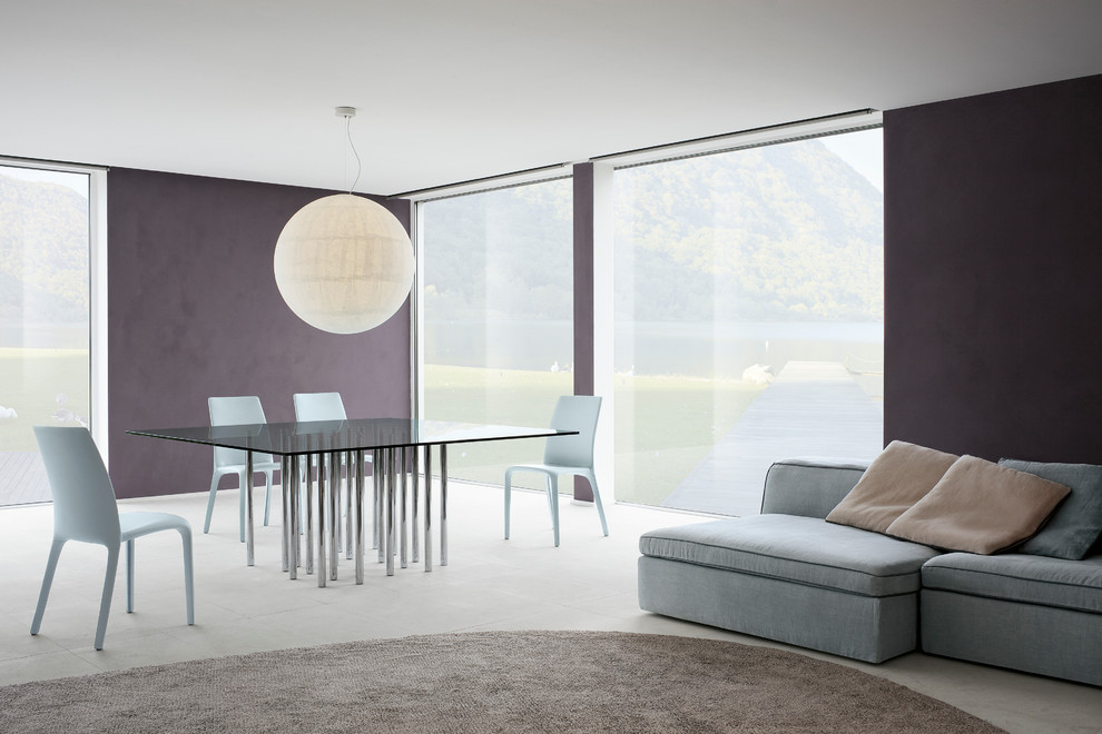 На фото: большая отдельная столовая в стиле модернизм с фиолетовыми стенами, полом из керамической плитки и бежевым полом