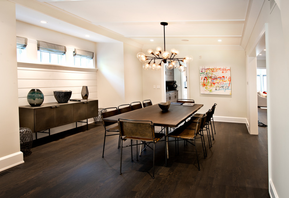 Idée de décoration pour une grande salle à manger ouverte sur la cuisine design avec un mur blanc, parquet peint, un sol marron et du lambris de bois.