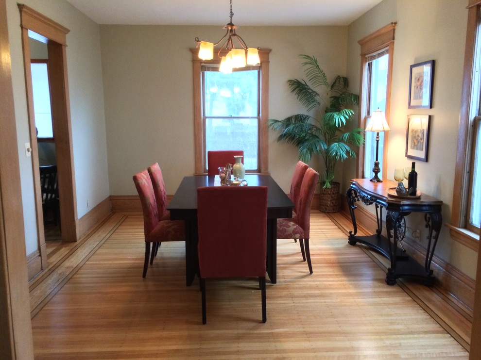 Mid-sized elegant light wood floor enclosed dining room photo in Minneapolis with beige walls and no fireplace