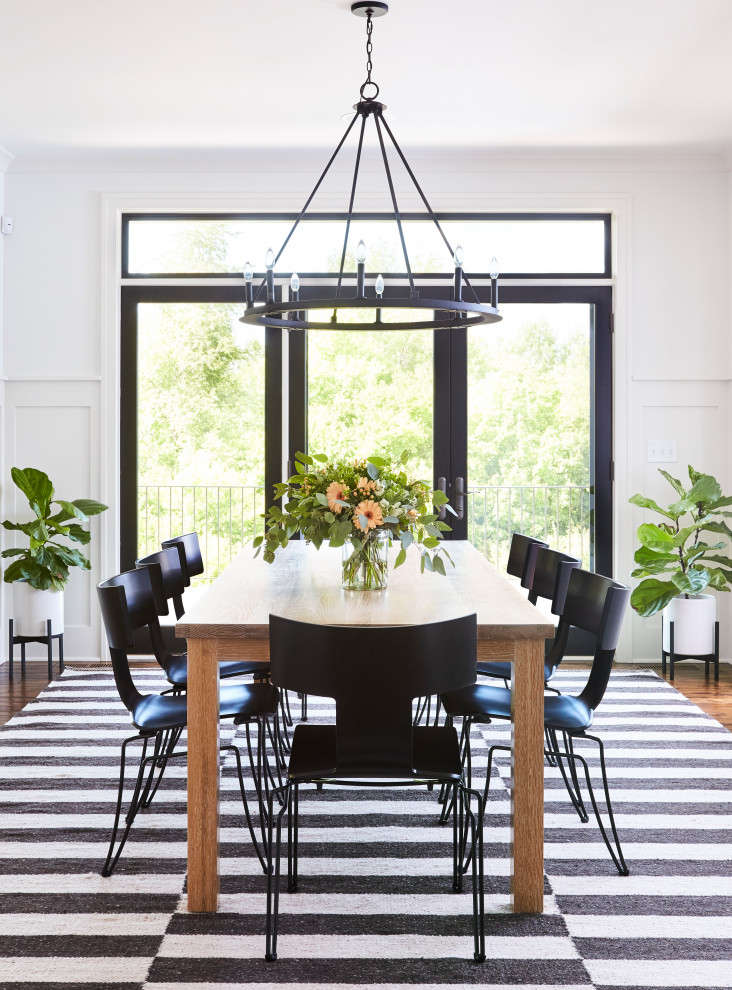 Photo of a farmhouse dining room in Minneapolis.