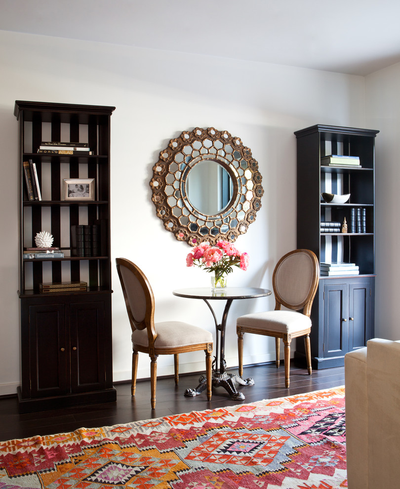 Inspiration for a contemporary dark wood floor dining room remodel in Boise with white walls
