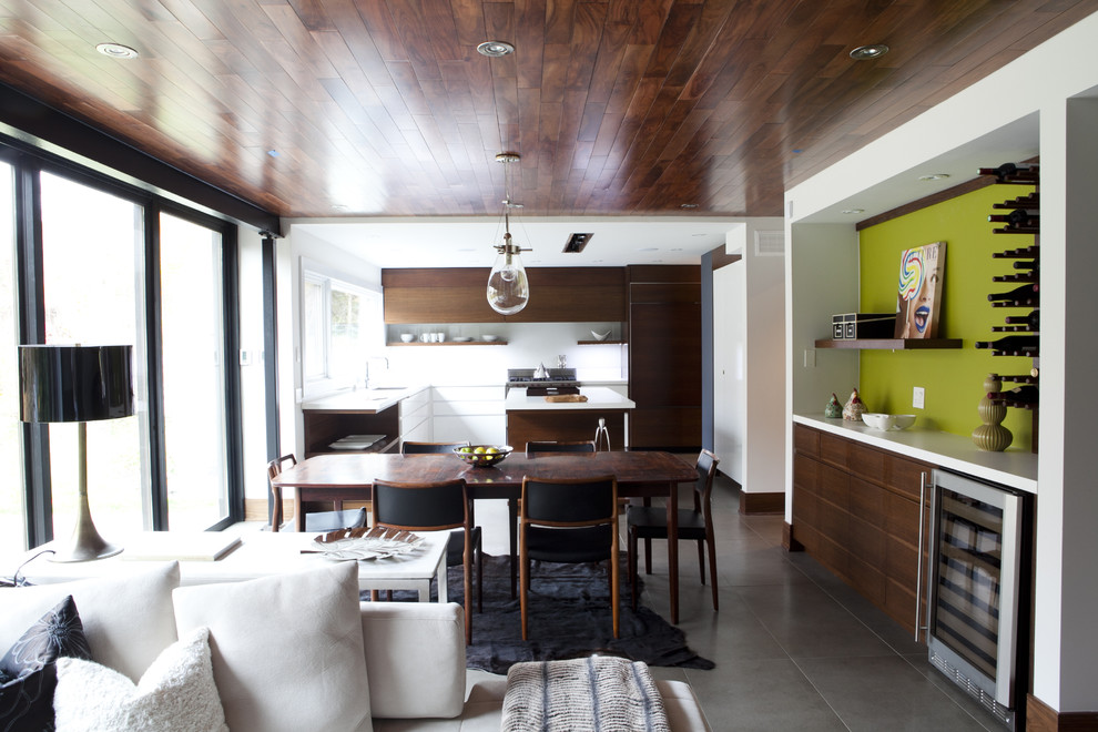 Idee per una sala da pranzo aperta verso il soggiorno design con pavimento con piastrelle in ceramica