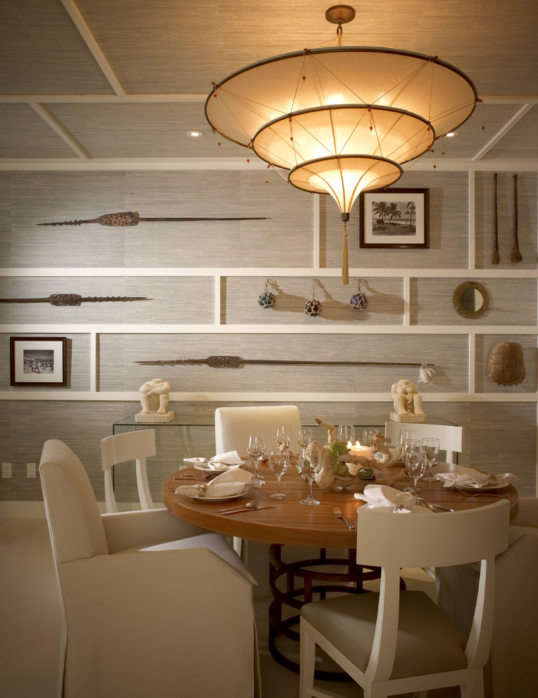 Inspiration for an eclectic dining room remodel in Miami with gray walls