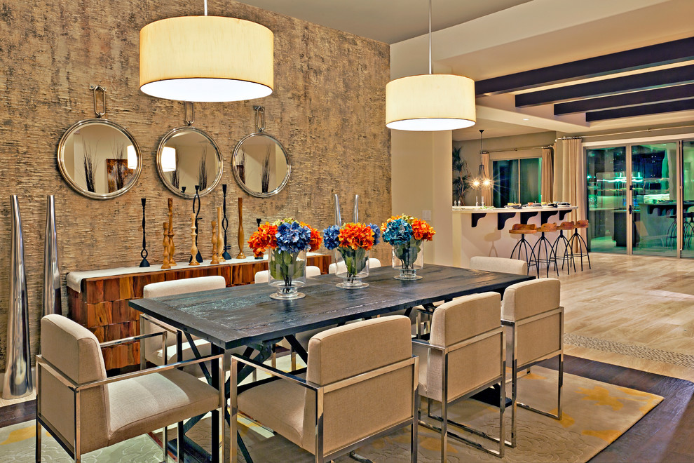 This is an example of a contemporary open plan dining room in Phoenix.