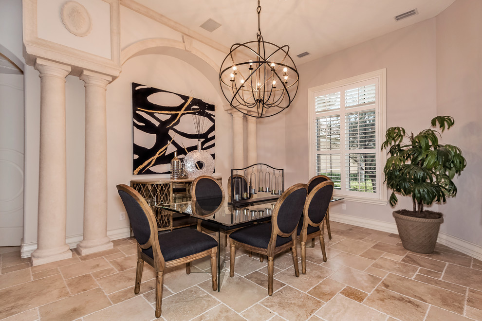 Inspiration for an expansive traditional dining room in Tampa with grey walls, travertine flooring and beige floors.