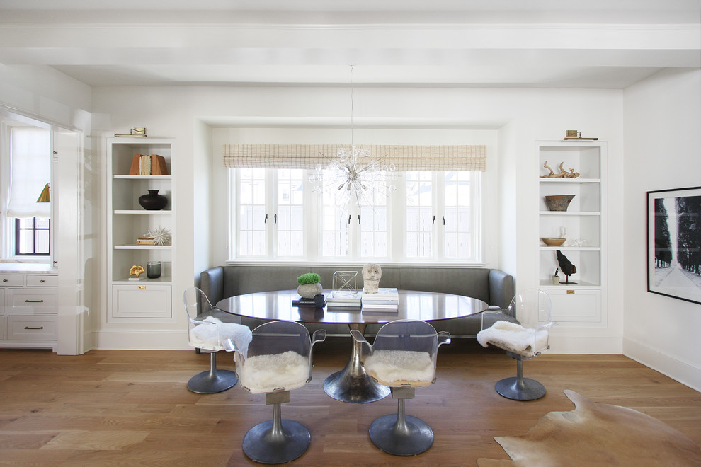 Inspiration for a transitional medium tone wood floor kitchen/dining room combo remodel in Charlotte with white walls