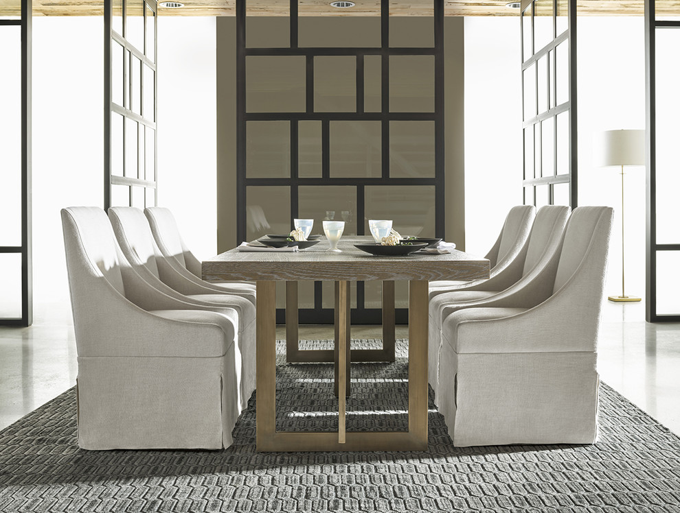 На фото: столовая в стиле модернизм с серыми стенами, бетонным полом и серым полом