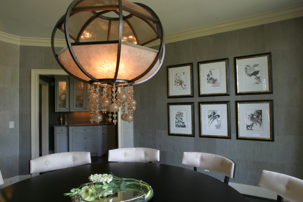 Design ideas for a traditional dining room in Other with grey walls.