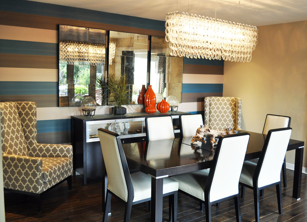 Medium sized contemporary enclosed dining room in Orange County with multi-coloured walls and dark hardwood flooring.