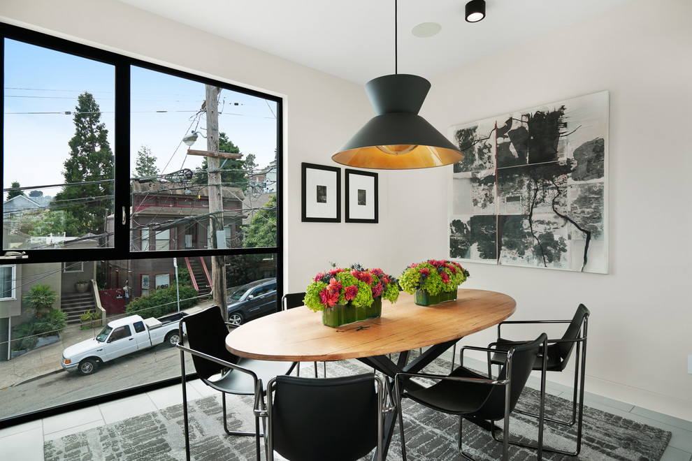 Mittelgroße Moderne Wohnküche mit weißer Wandfarbe und grauem Boden in San Francisco