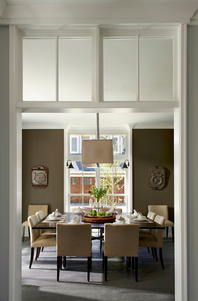 Photo of a country enclosed dining room in Chicago with brown walls.
