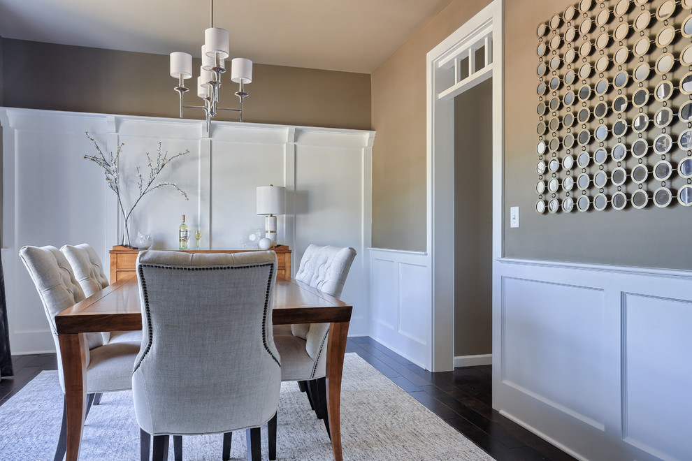 Mid-sized elegant dark wood floor enclosed dining room photo in Philadelphia with beige walls
