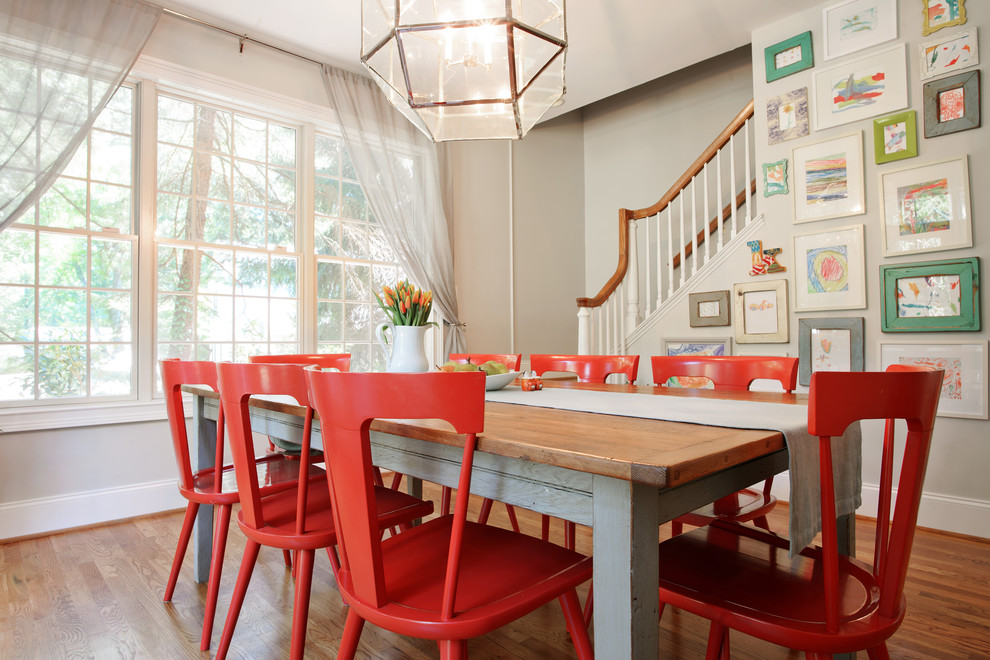 Photo of a medium sized rural dining room in Philadelphia with medium hardwood flooring, no fireplace and grey walls.