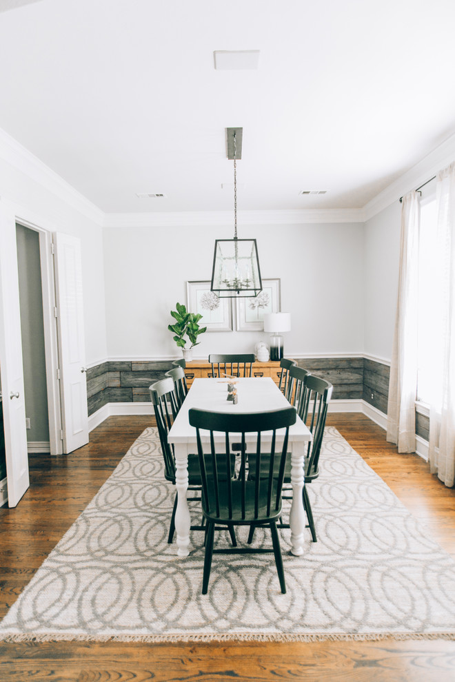 Example of a farmhouse dining room design in Dallas