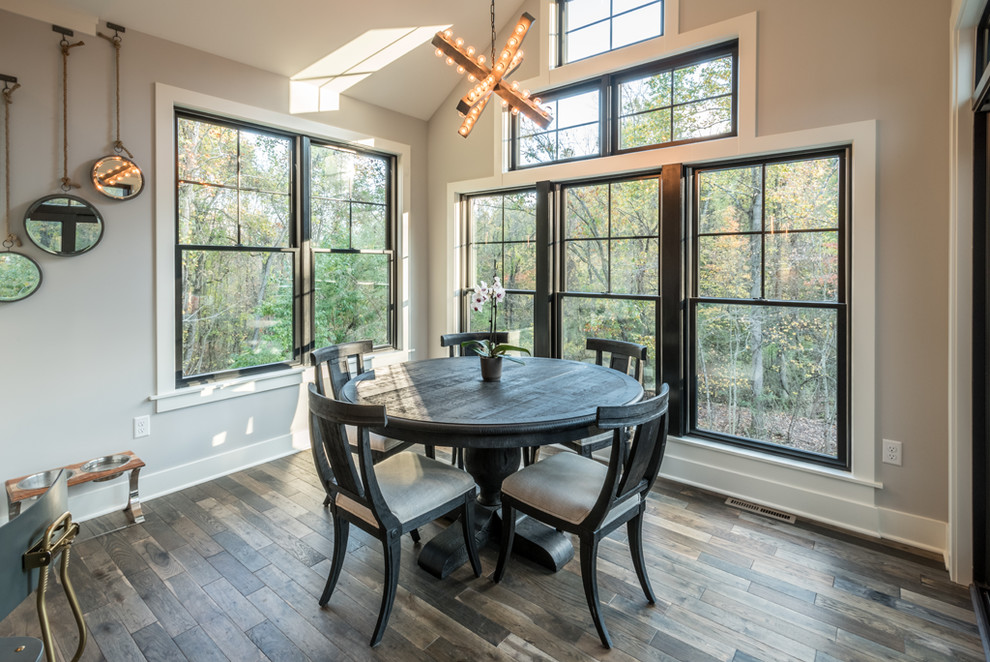 Kitchen/dining room combo - cottage dark wood floor and brown floor kitchen/dining room combo idea in Other with gray walls