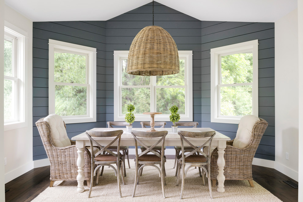 Inspiration for a mid-sized cottage dark wood floor and brown floor dining room remodel in Minneapolis with blue walls