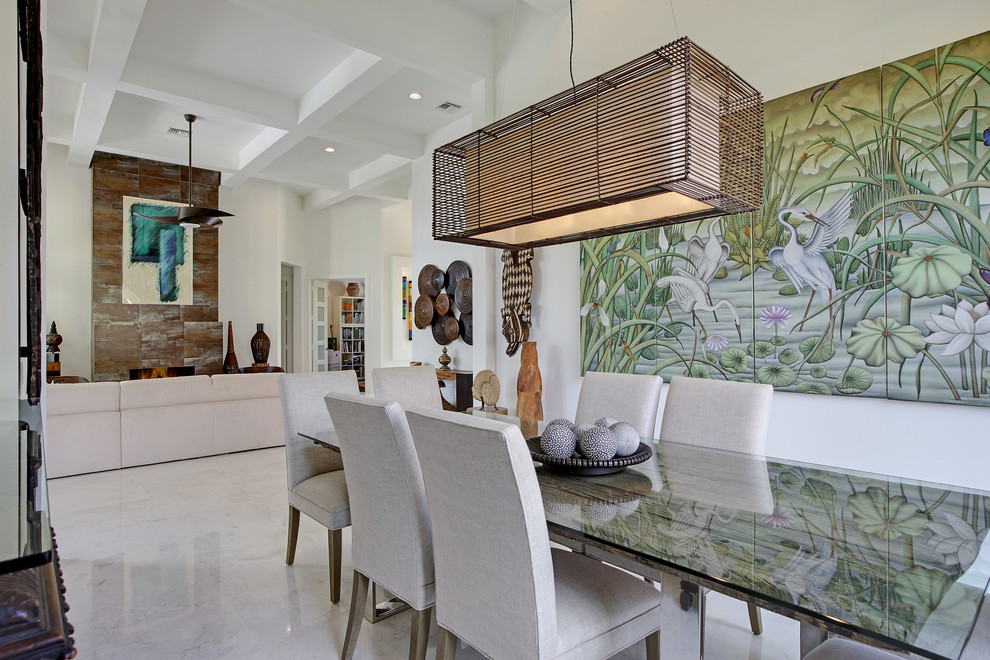 Inspiration for a contemporary dining room in Miami with white walls.