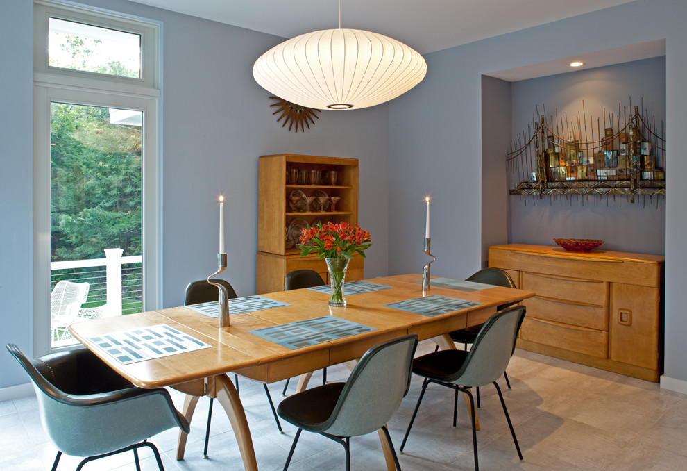 Immagine di una sala da pranzo aperta verso il soggiorno moderna di medie dimensioni con pavimento con piastrelle in ceramica