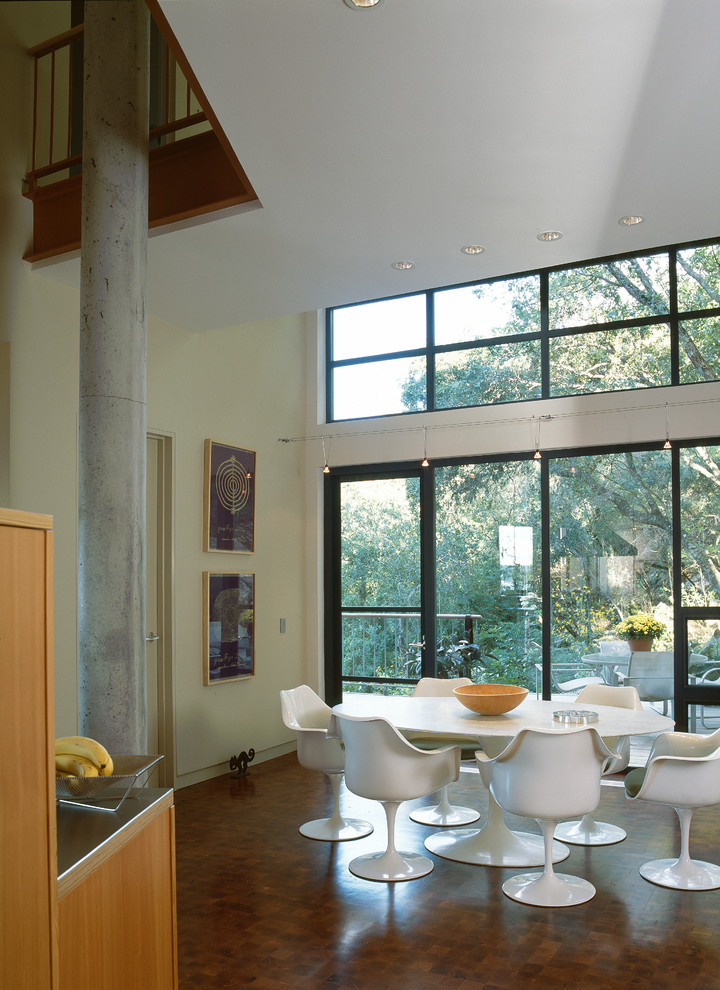 Example of a minimalist dining room design in Austin