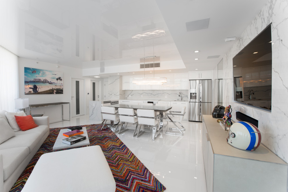 На фото: кухня-столовая среднего размера в стиле модернизм с полом из керамогранита, белым полом, панелями на части стены и белыми стенами