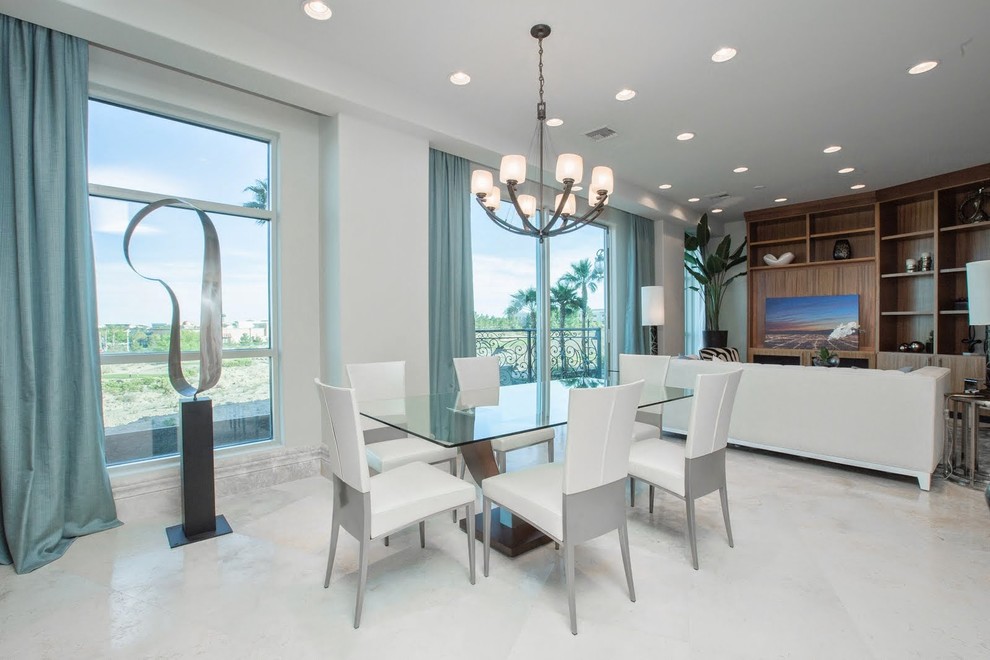 Ispirazione per una grande sala da pranzo aperta verso il soggiorno moderna con pareti bianche e pavimento in marmo