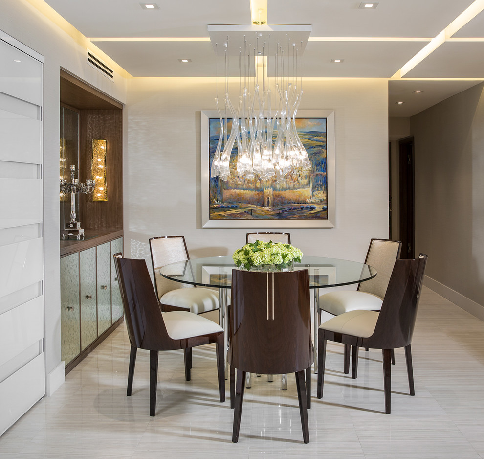 Inspiration for a mid-sized contemporary marble floor dining room remodel in Miami with beige walls and no fireplace