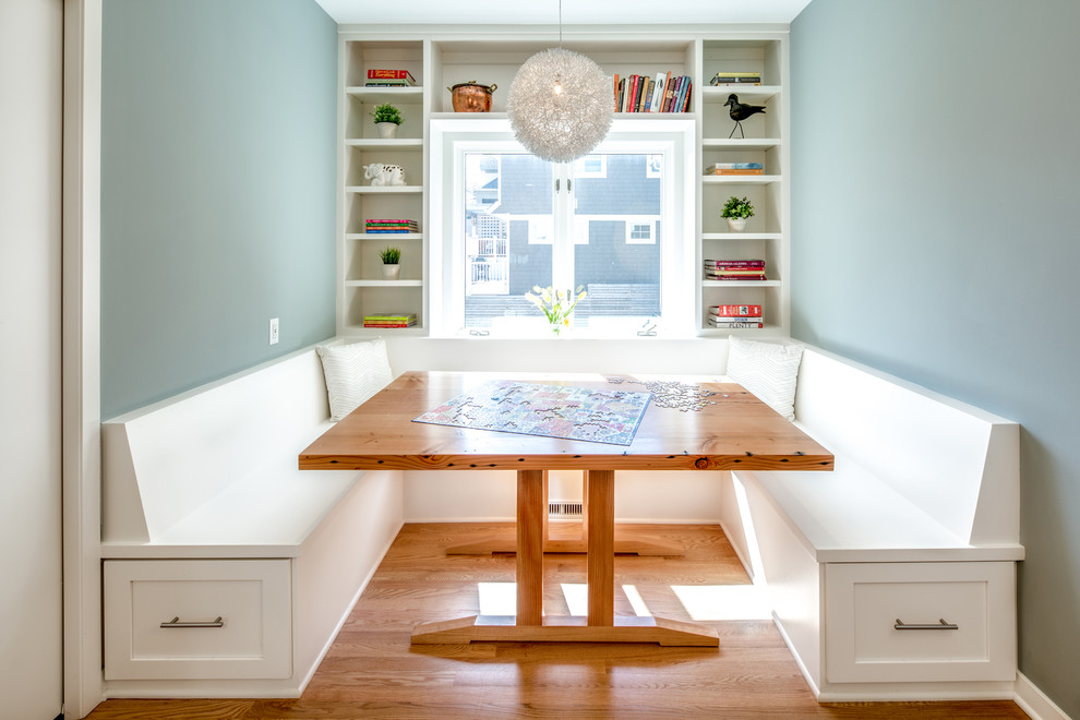 Dining room - transitional medium tone wood floor dining room idea in Minneapolis with blue walls and no fireplace