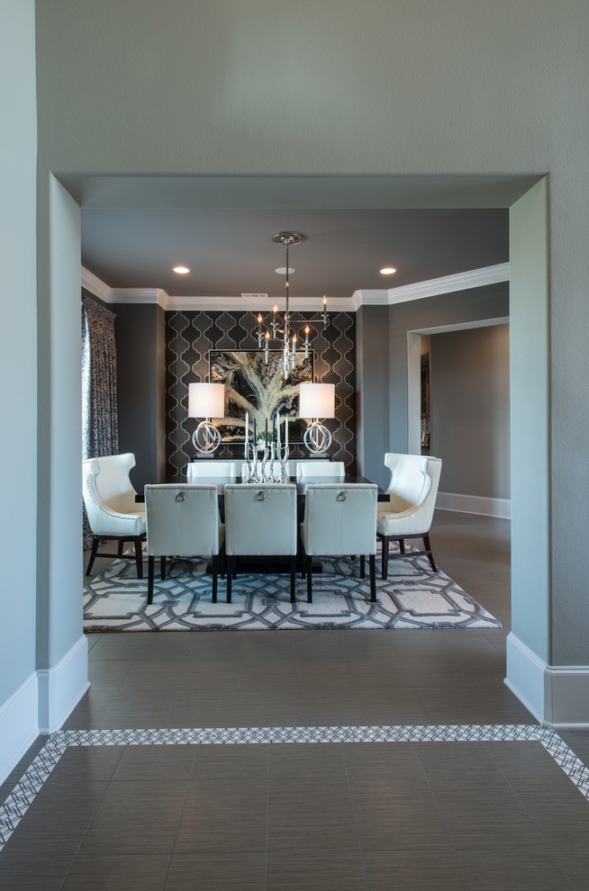 This is an example of a medium sized contemporary kitchen/dining room in Dallas with grey walls and ceramic flooring.