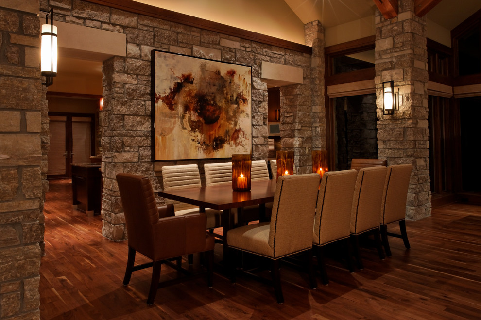 Example of a huge trendy medium tone wood floor great room design in Omaha with beige walls