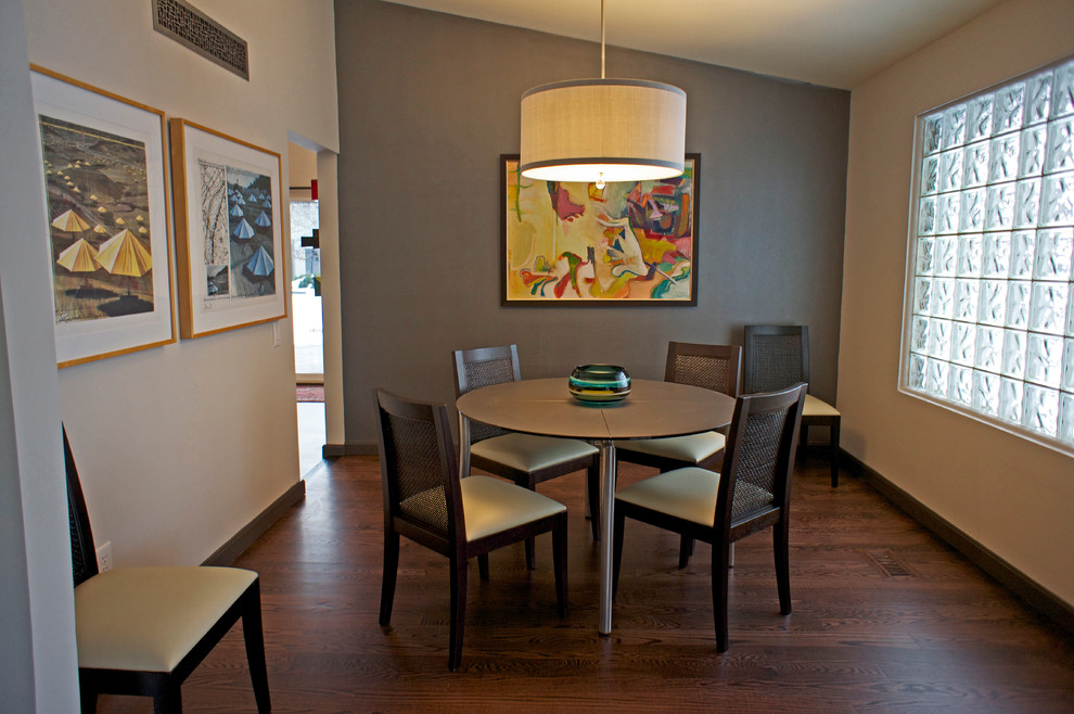 Example of a minimalist dining room design in Detroit