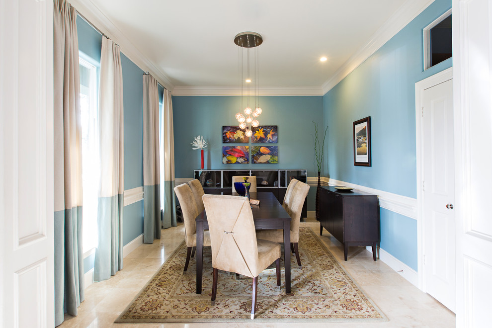Trendy dining room photo in Houston with blue walls and no fireplace