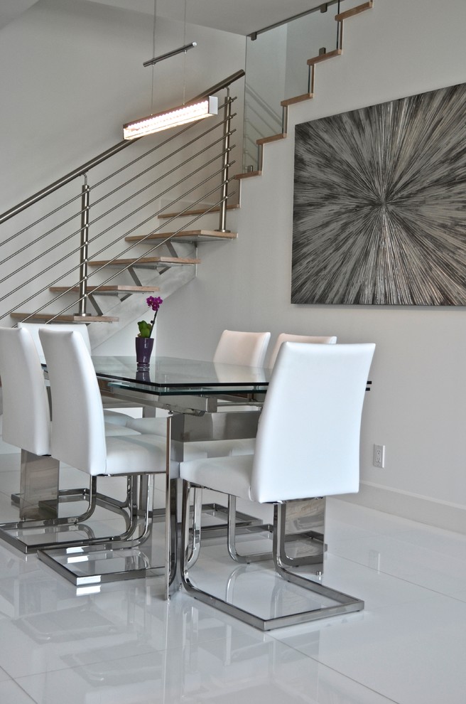 Great room - small modern porcelain tile great room idea in Miami with white walls