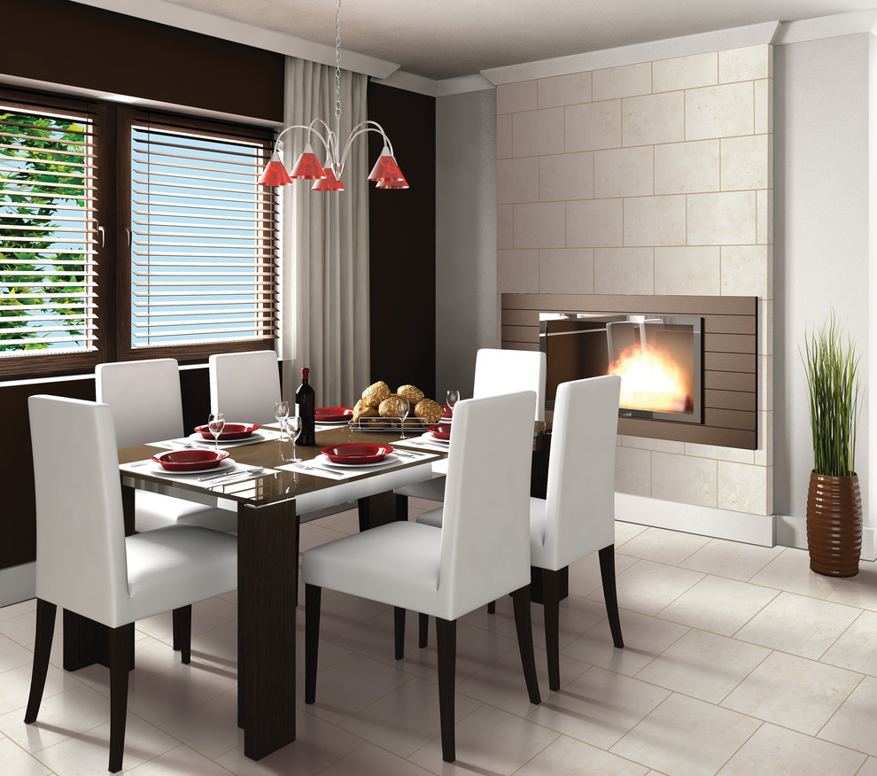 Exemple d'une salle à manger tendance fermée et de taille moyenne avec un mur gris, un sol en carrelage de porcelaine, une cheminée standard, un manteau de cheminée en métal et un sol beige.