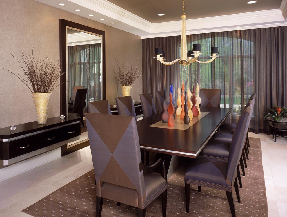 Photo of a modern dining room in Miami with brown walls.