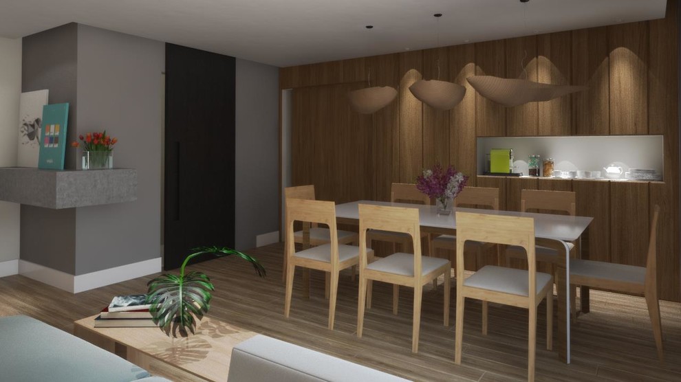 This is an example of a medium sized contemporary kitchen/dining room in Other with multi-coloured walls and light hardwood flooring.