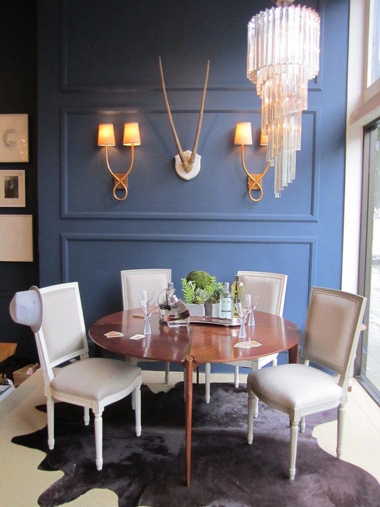 Inspiration for a contemporary dining room in San Francisco with blue walls.