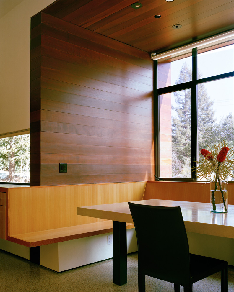 Immagine di una grande sala da pranzo minimalista