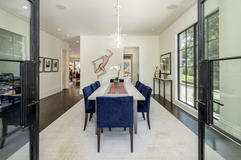 Design ideas for a contemporary dining room in Atlanta with white walls, dark hardwood flooring and brown floors.