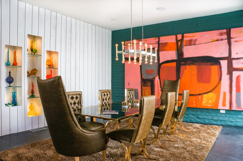 Example of a 1960s dining room design in Other with green walls and no fireplace
