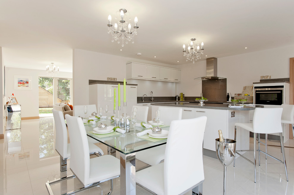 Photo of a contemporary kitchen/dining room in Dorset with white walls.