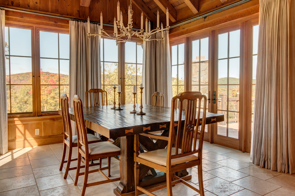 Kitchen/dining room combo - rustic kitchen/dining room combo idea in Other