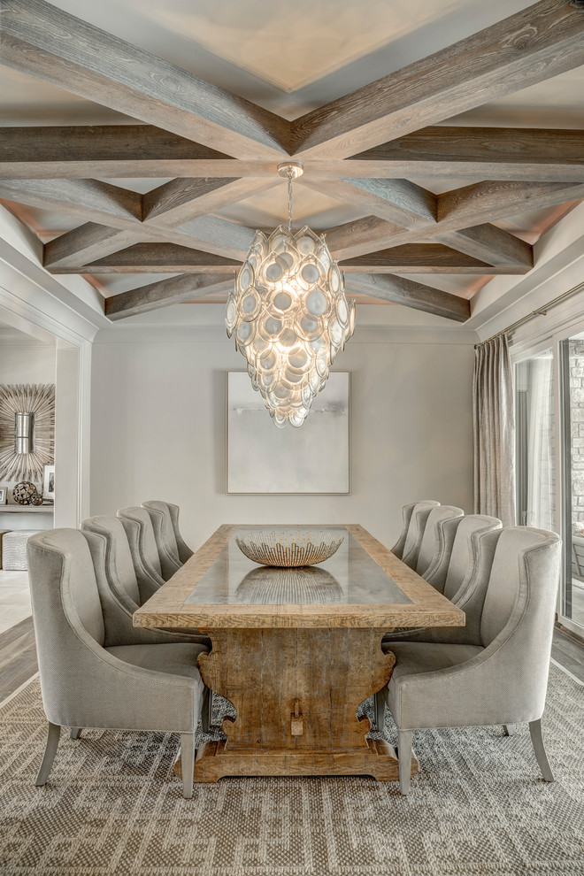 Inspiration for a classic dining room in Charlotte with grey walls, medium hardwood flooring and grey floors.