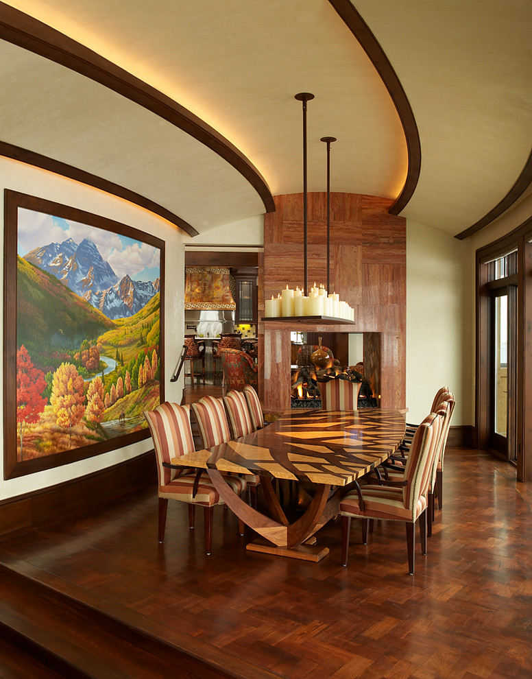 Example of a mountain style dining room design in Denver