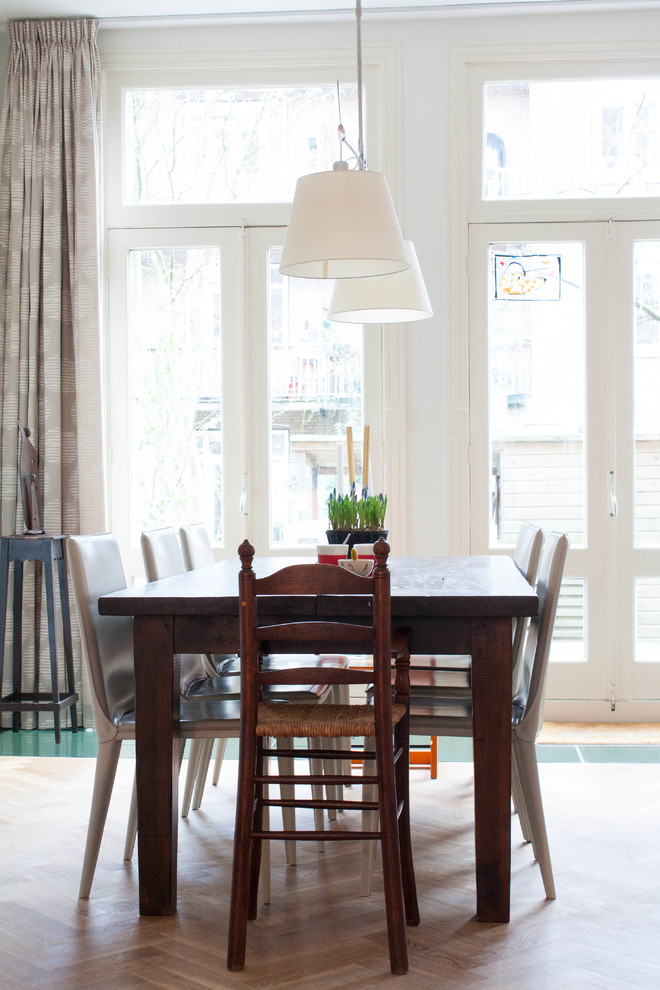 Dining room - eclectic dining room idea in Amsterdam