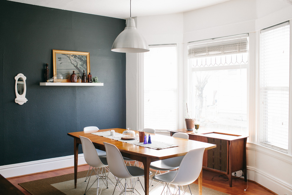 Photo of a medium sized classic dining room in Seattle with grey walls and medium hardwood flooring.