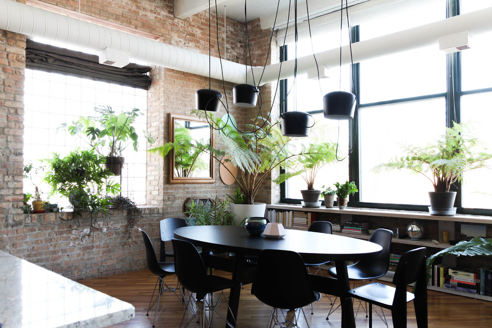 Inspiration for an industrial dining room remodel in Chicago