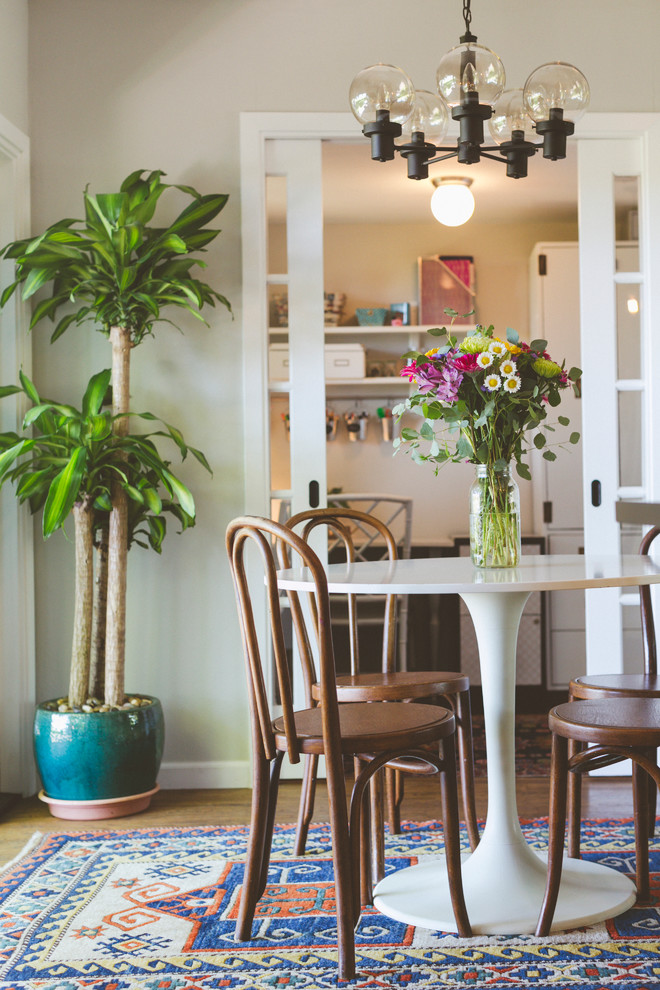 Example of an eclectic dining room design in Austin